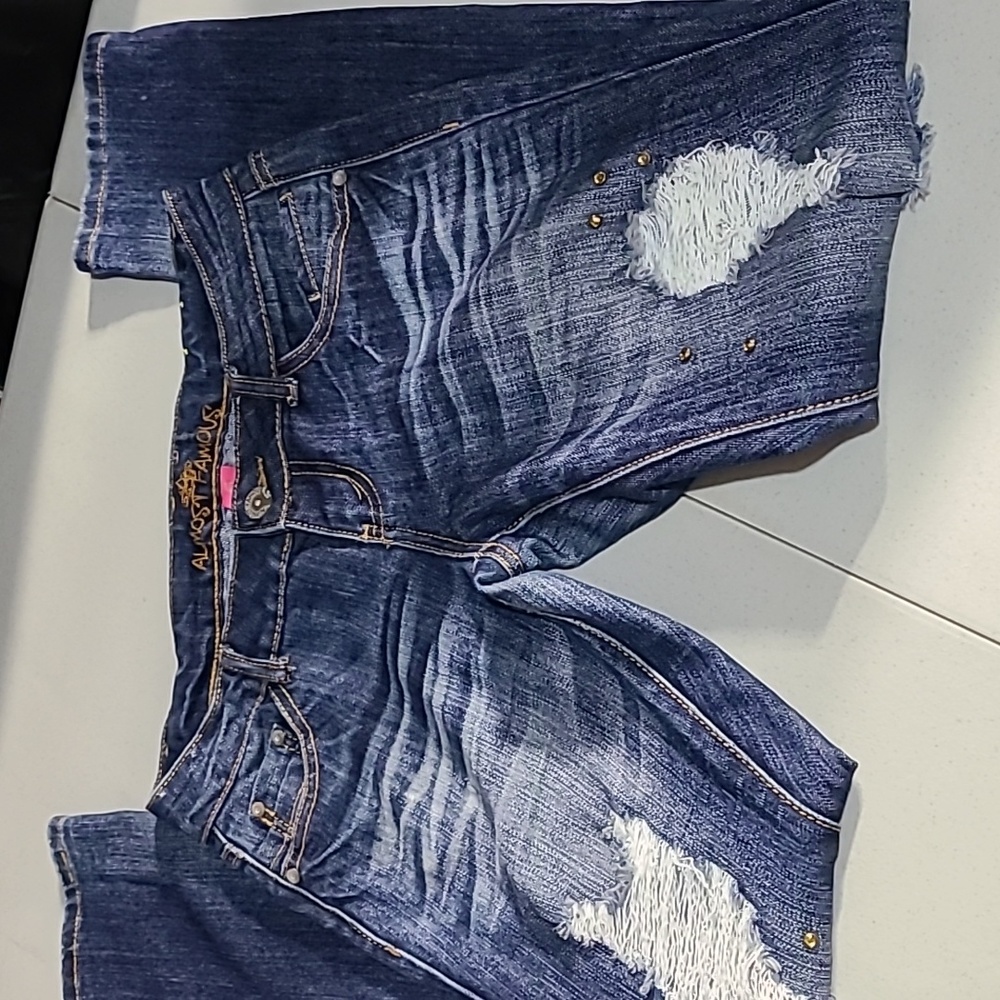 Almost famous destressed jeans size 5 junior